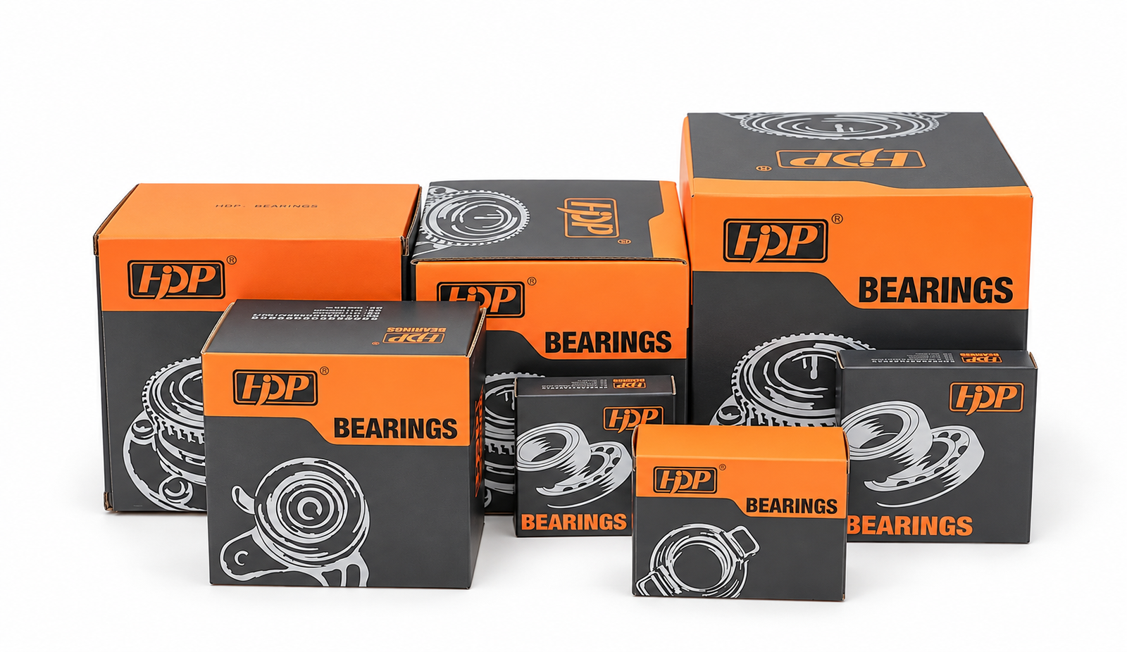 Three wheel hub bearing designs lined up on a workbench showing cartridge, single-flange and complete hub unit types