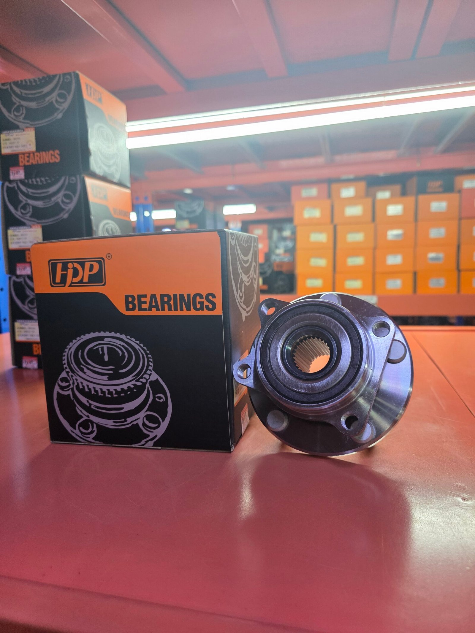 Cylindrical roller bearing on a granite surface plate set up for dimensional inspection